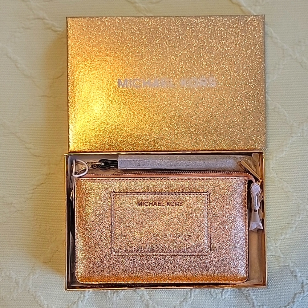 Michael Kors rose gold wristlet